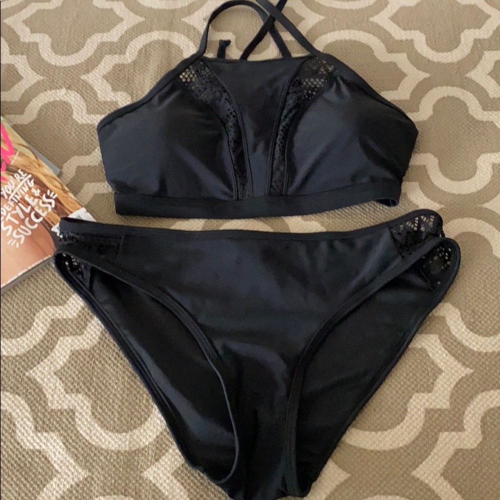 “Fashion World,” black bikini; size medium